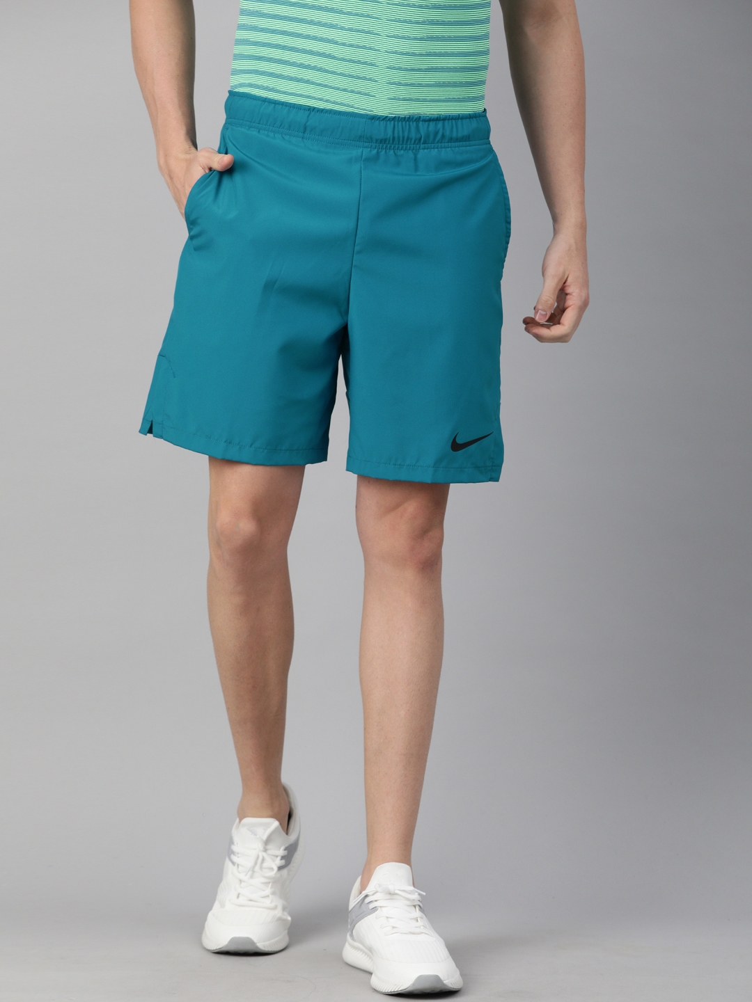 teal nike woven shorts