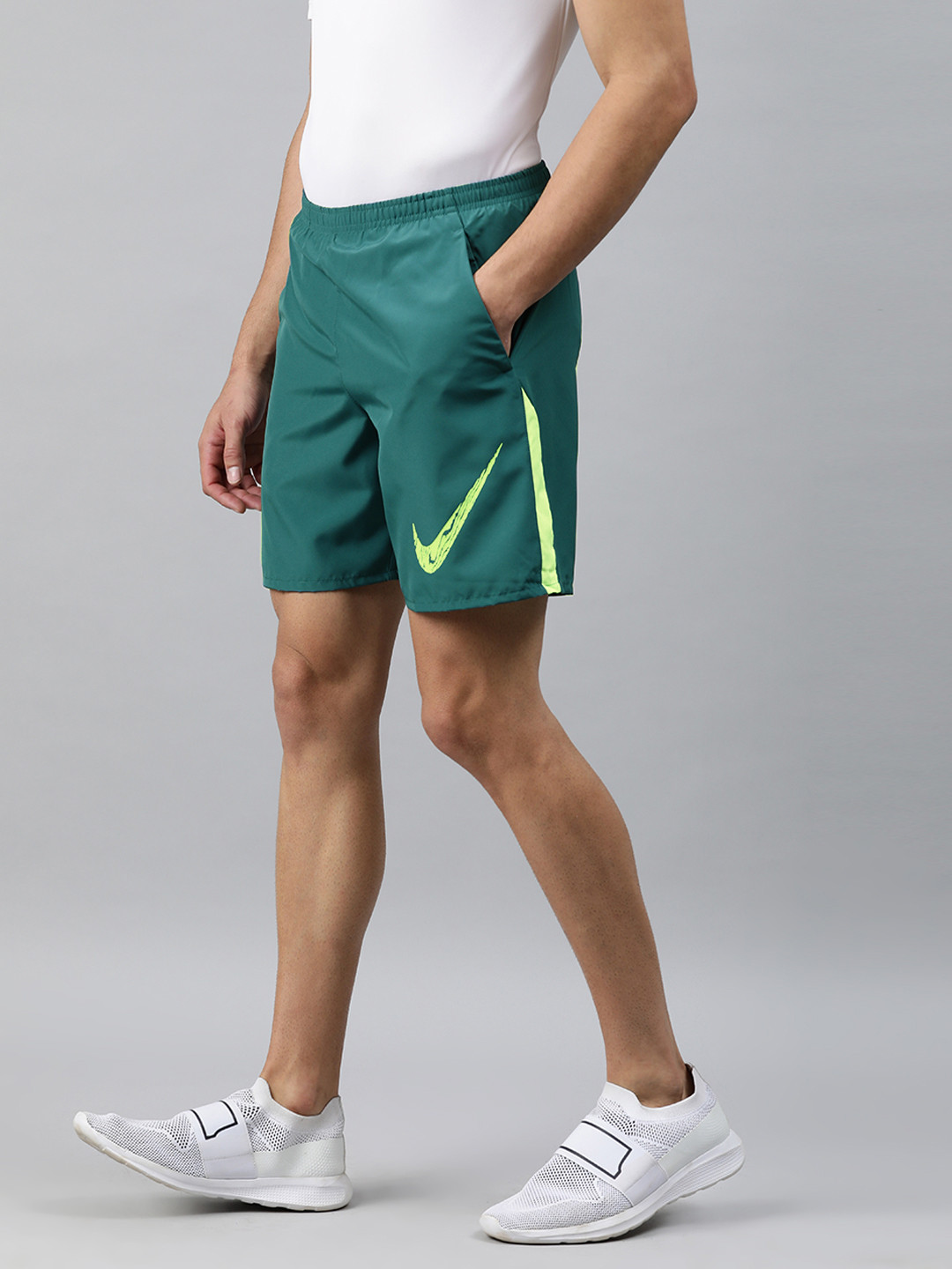 Buy Nike Men Green Solid Standard Fit RUN SHORT 7IN BF WR GX DRI FIT