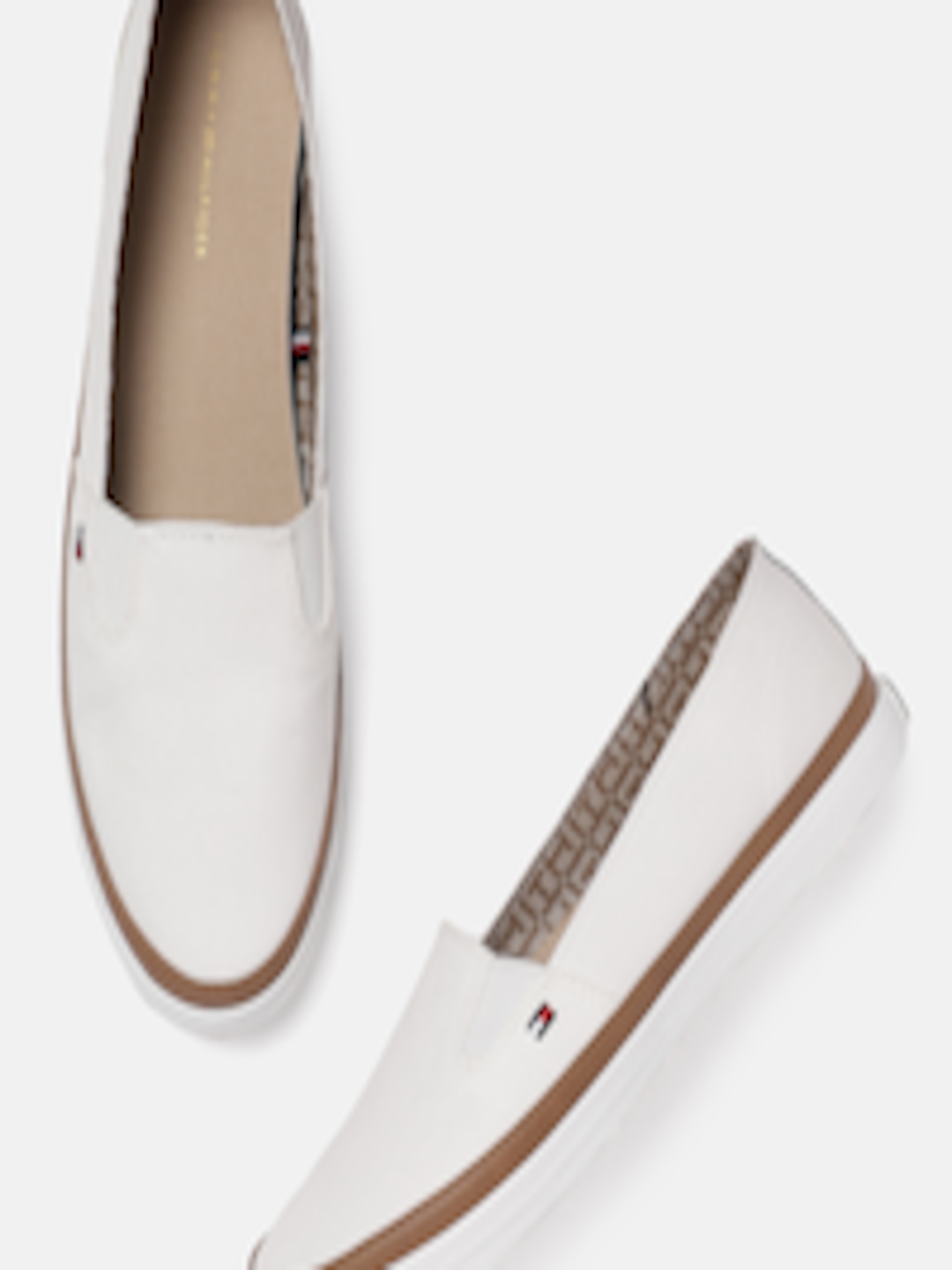 Buy Tommy Hilfiger Women White Solid ICONIC KESHA Slip On Sneakers