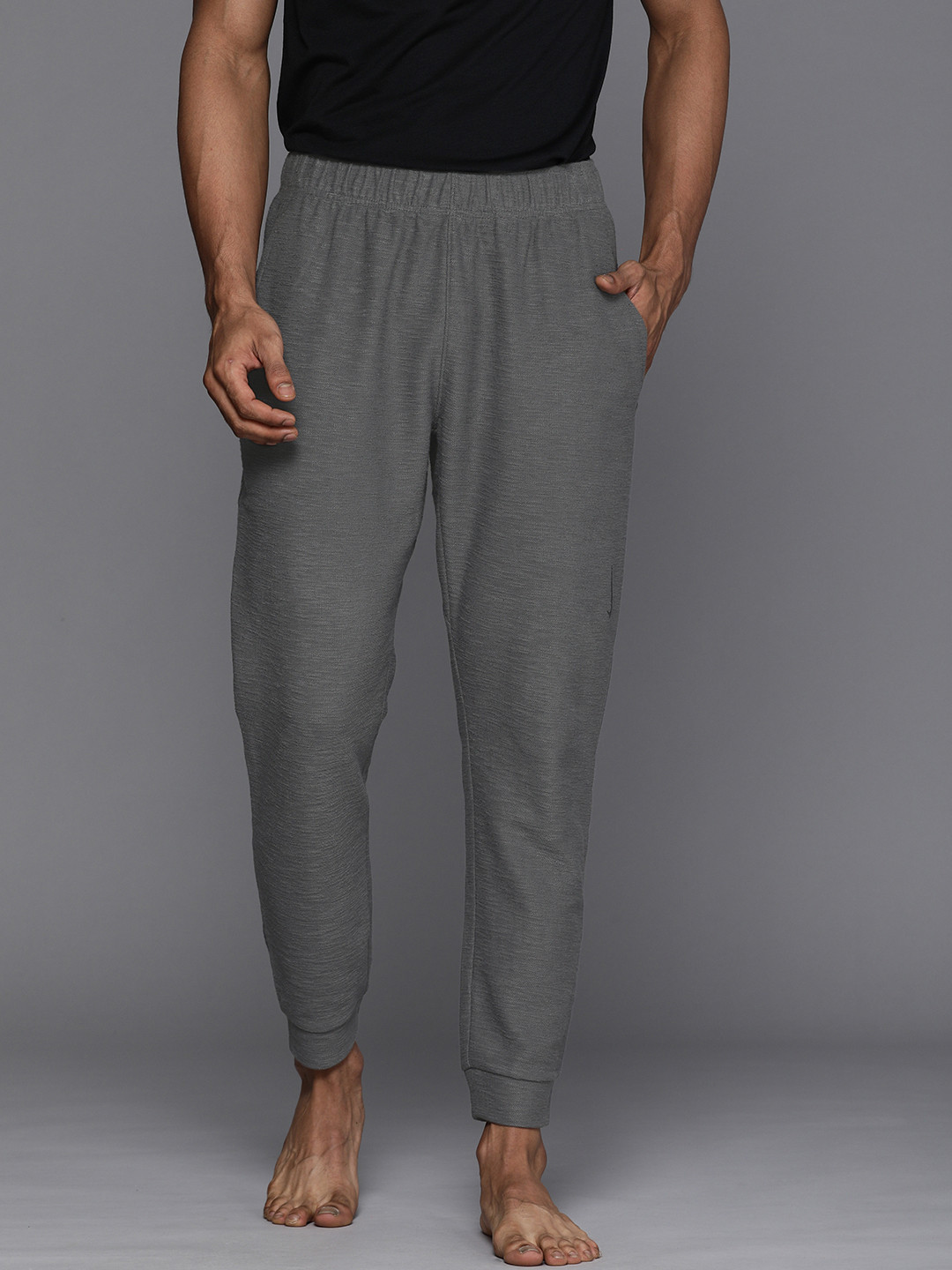 Buy Nike Men Grey Melange Solid CORE Straight Fit Yoga Joggers Track