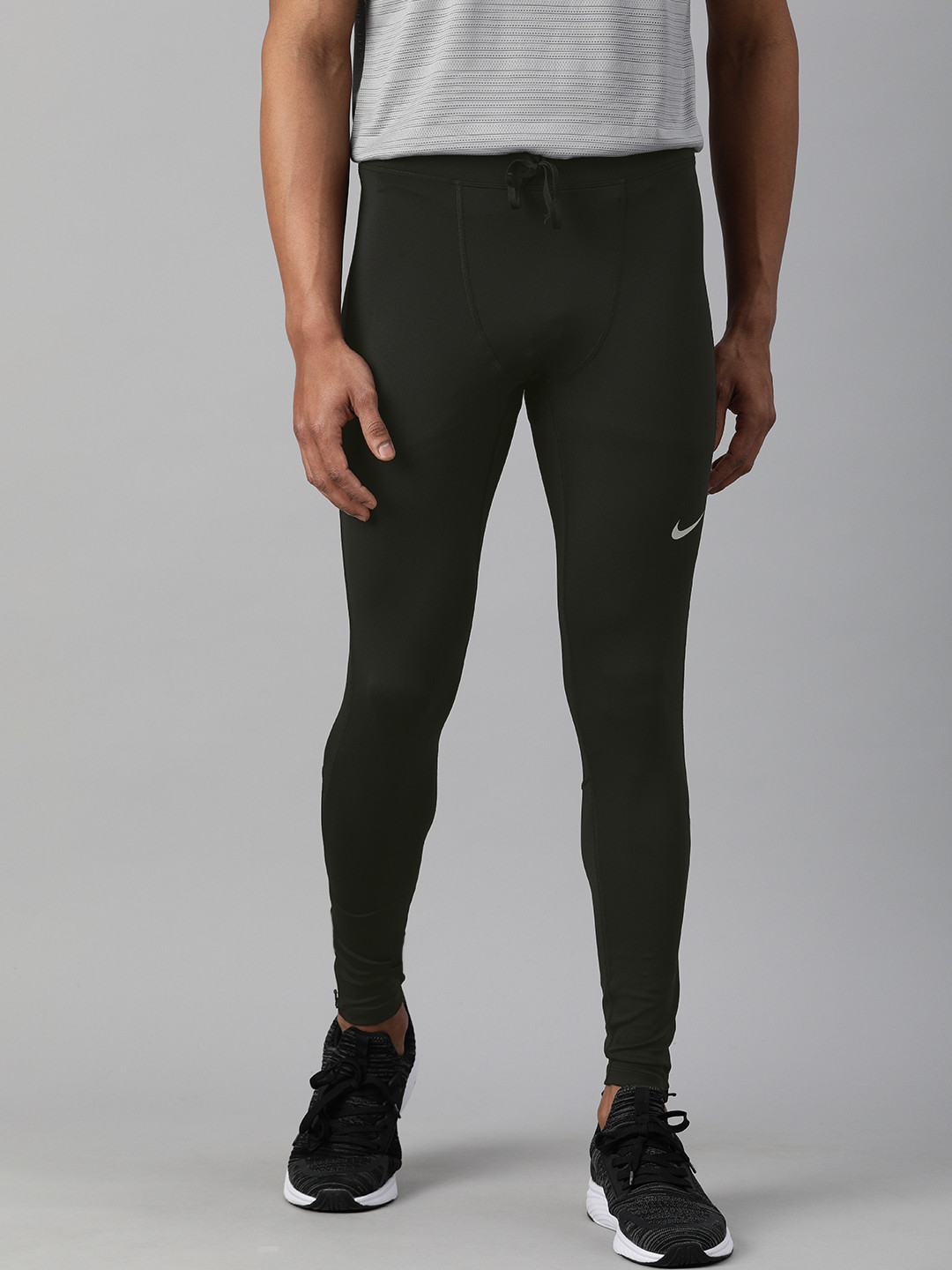 Buy Nike Men Solid Dri FIT Challenger Running Tights Tights for Men