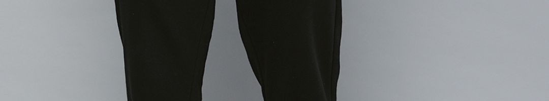 Buy Puma Men Grey Melange Solid Regular Fit Logo Track Pants - Track ...