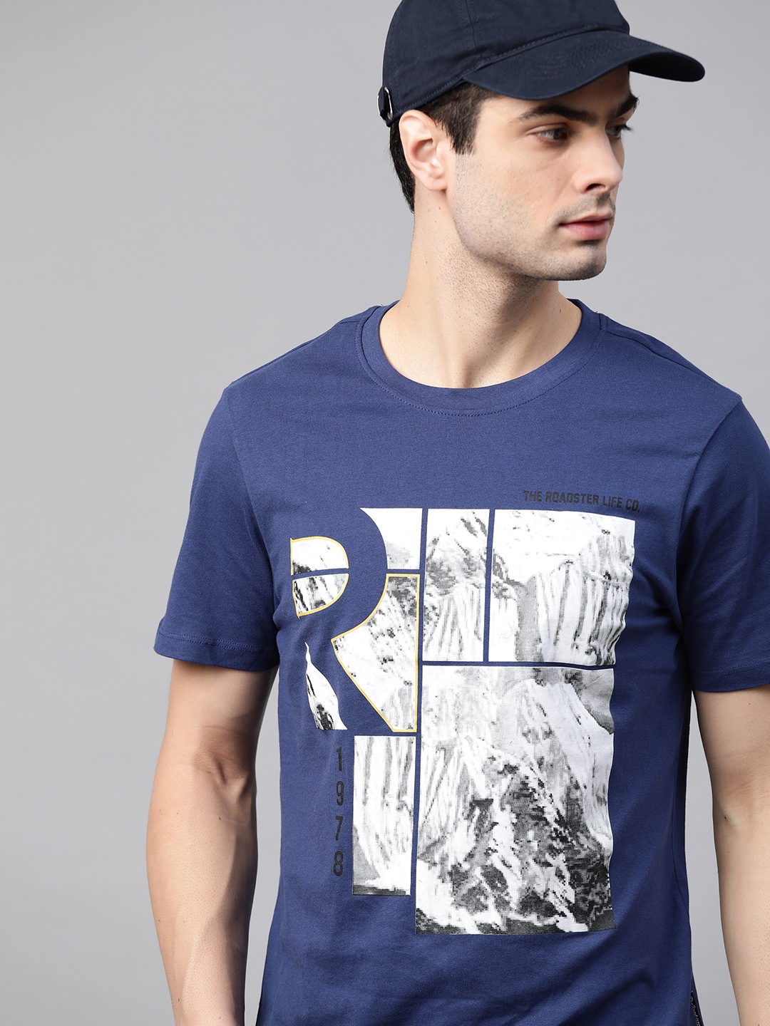 dark blue and white graphic tee