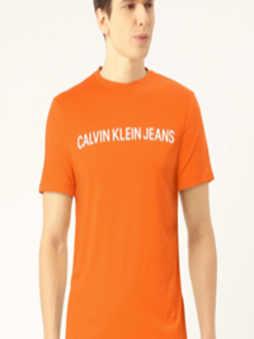 Buy Calvin Klein Jeans Men Orange Solid Slim Fit Round Neck T Shirt ...
