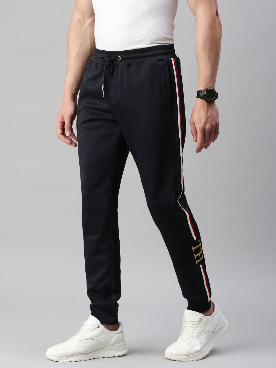 Buy Tommy Hilfiger Men Black Solid Straight Fit TH MONOGRAM Joggers ...