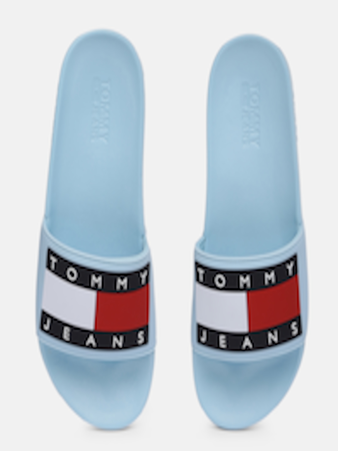 Buy Tommy Hilfiger Women Blue Self Design Sliders - Flip Flops for ...