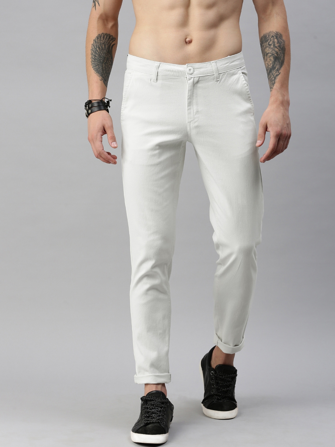 Buy Roadster Men White Regular Fit Solid Regular Trousers - Trousers ...