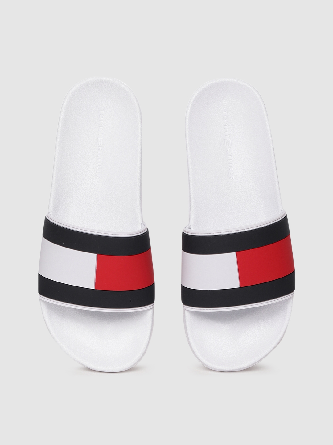 Buy Tommy Hilfiger Men White & Black Colourblocked Sliders - Flip Flops ...