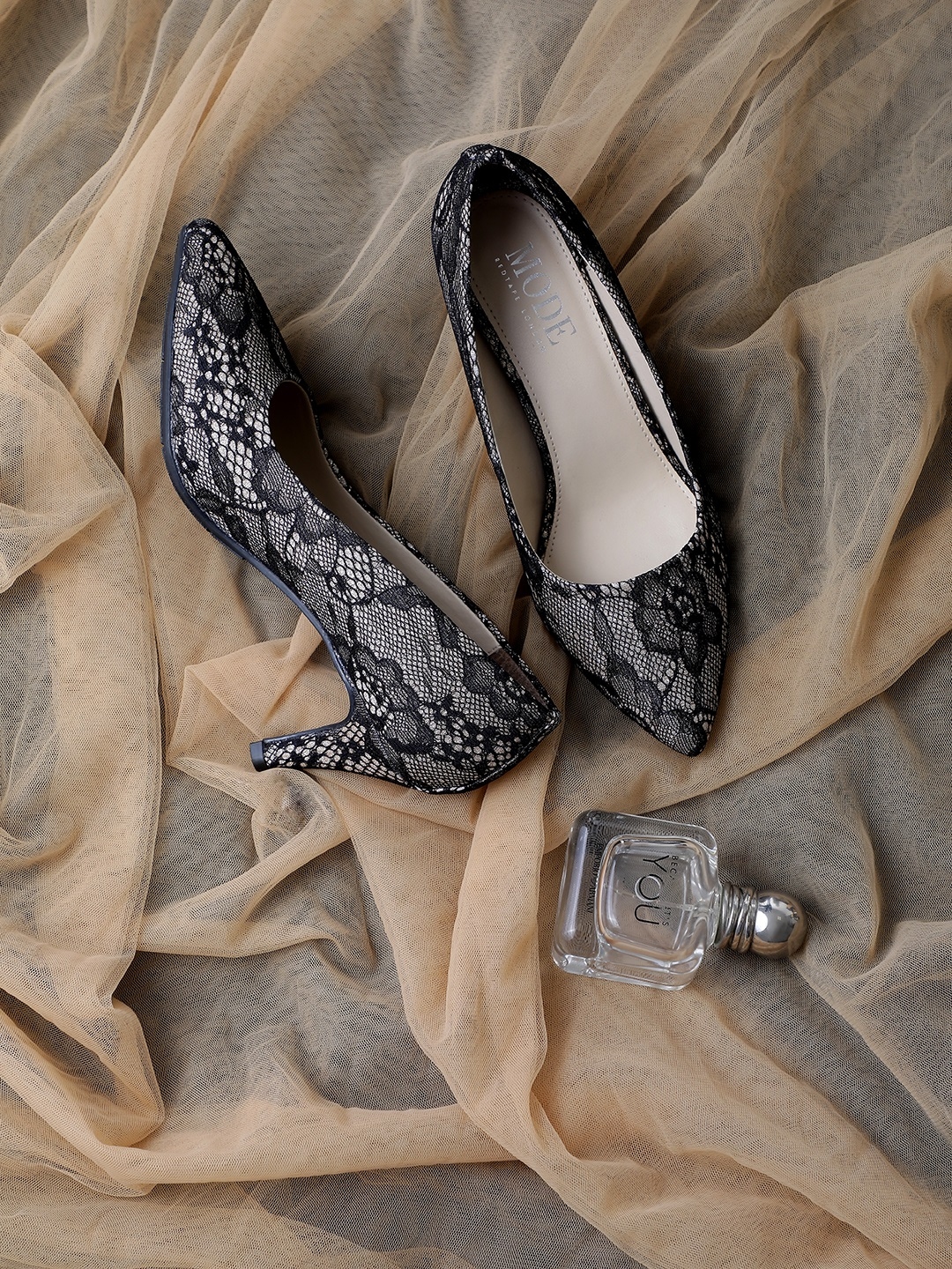 mode by red tape pumps