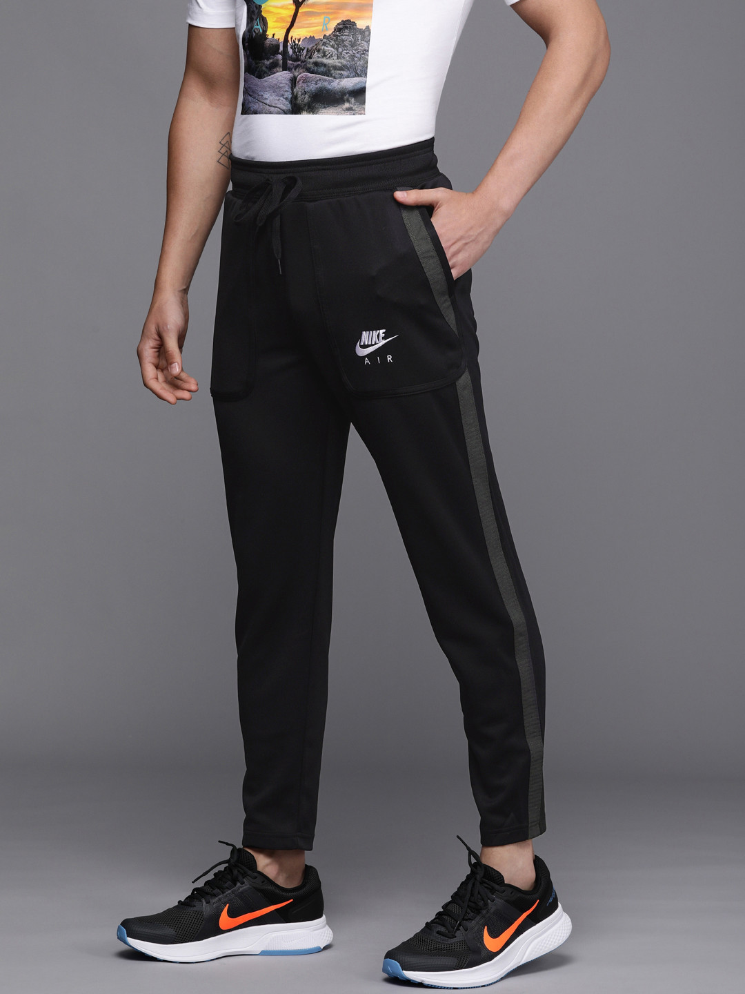 Buy Nike Men Black Solid Air Track Pants Track Pants for Men 14028778