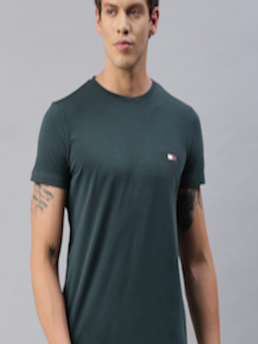 Buy Tommy Hilfiger Men Teal Green Solid Slim Fit Round Neck T Shirt ...