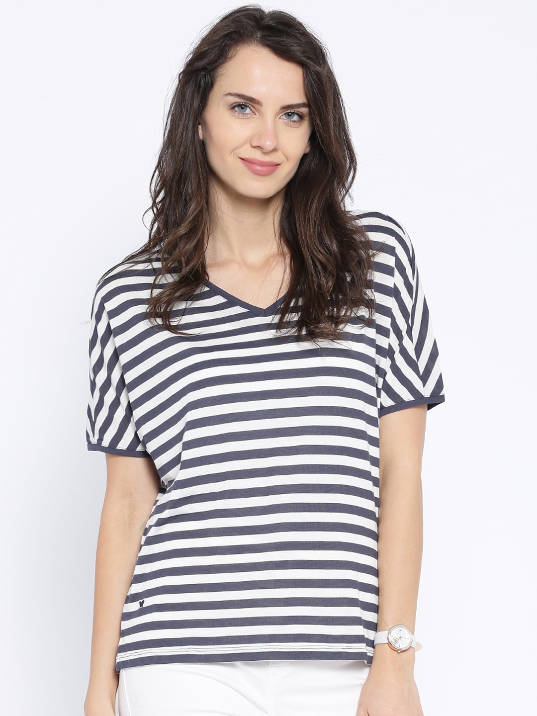 blue and white striped shirt with black pants