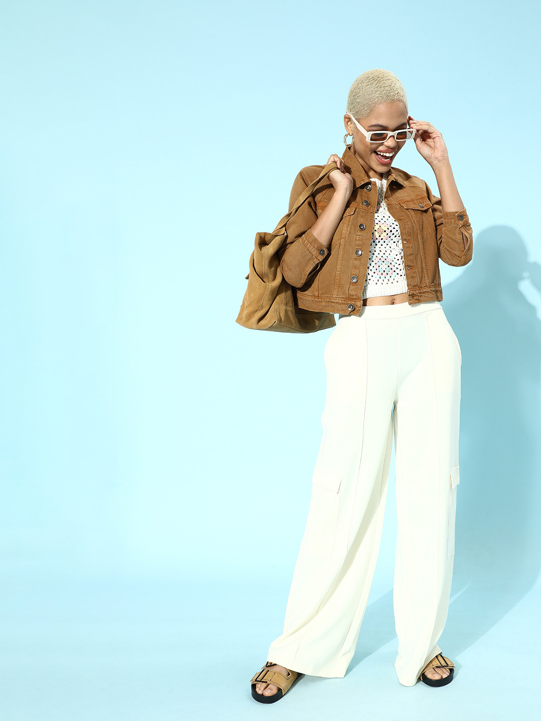 Buy Roadster Women Chic Brown Solid Denim Trucker Jacket Jackets for