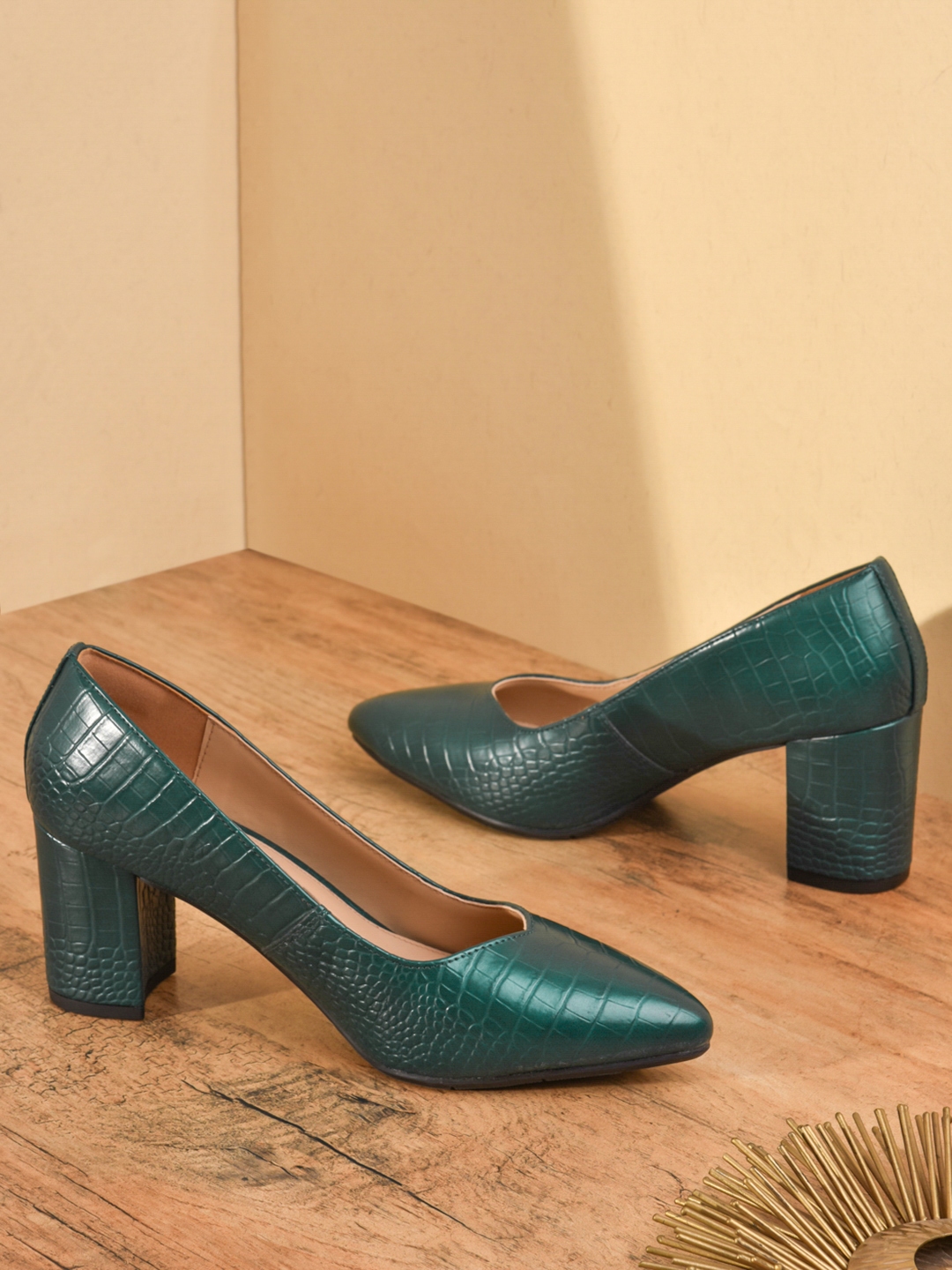 mode by red tape pumps
