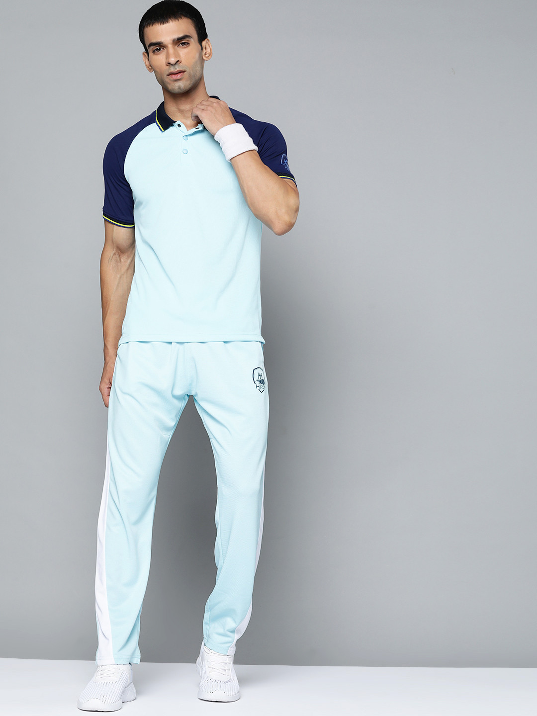 Buy HRX By Hrithik Roshan Men Blue Solid Rapid Dry & Antimicrobial