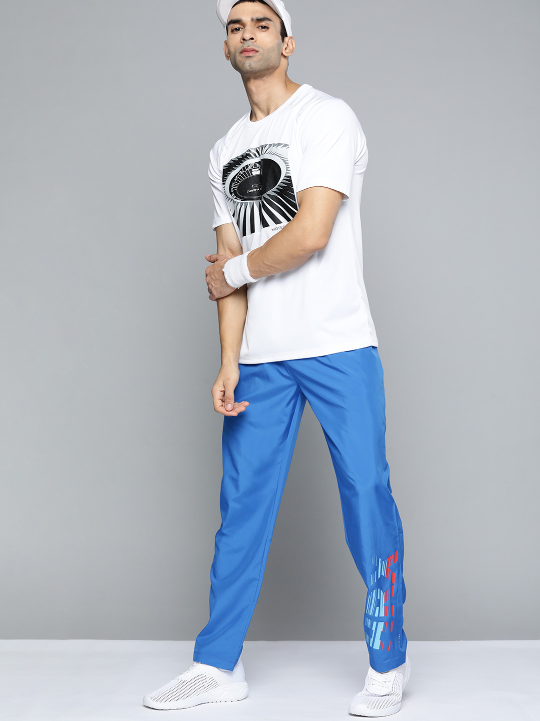 Buy HRX By Hrithik Roshan Cricket Men Blue Rapid Dry Solid Track Pants
