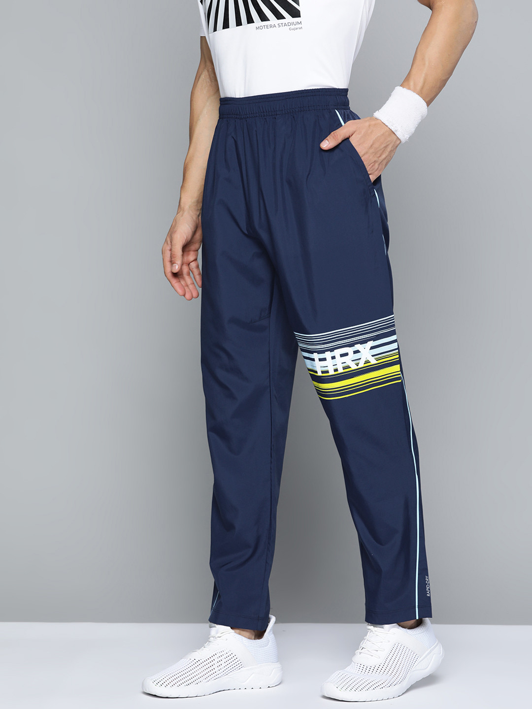 Buy HRX By Hrithik Roshan Cricket Men Navy Blue Rapid Dry Solid Track