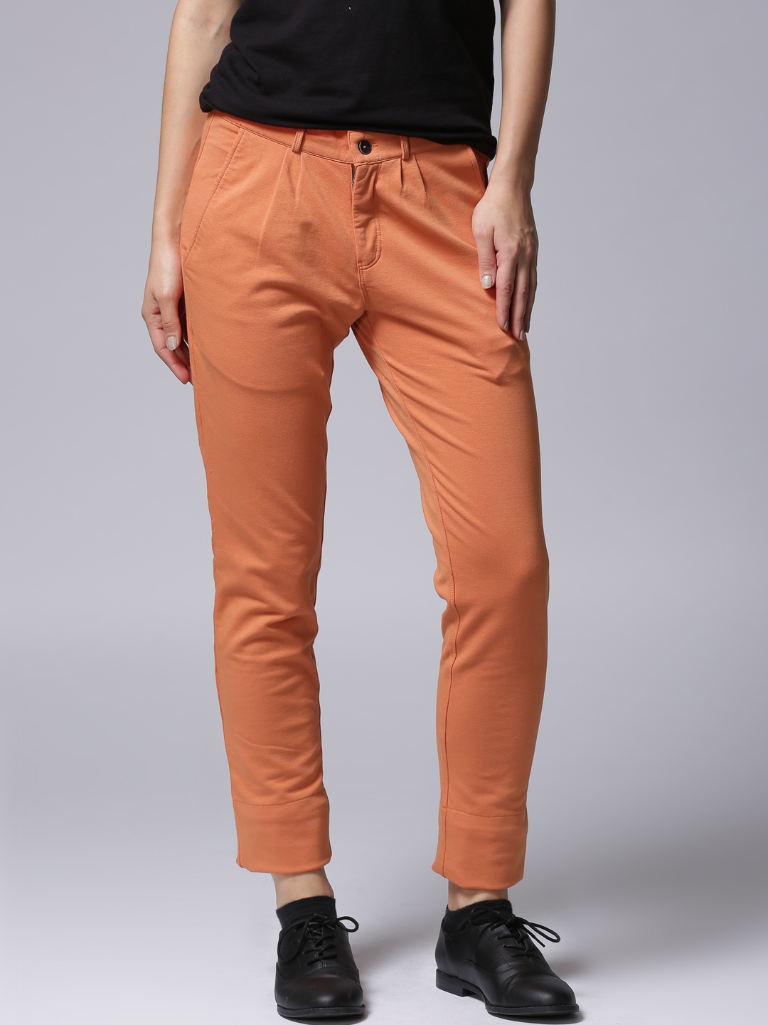 dark orange trousers