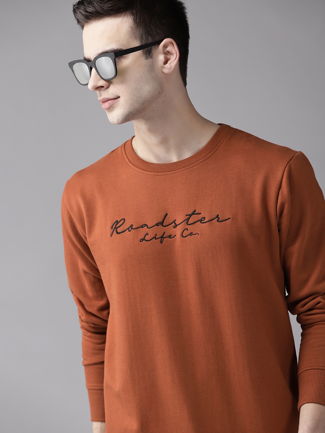 rust sweatshirt