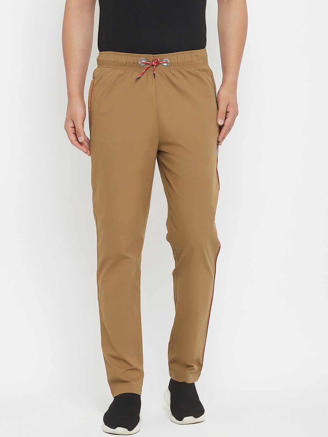 khaki track top