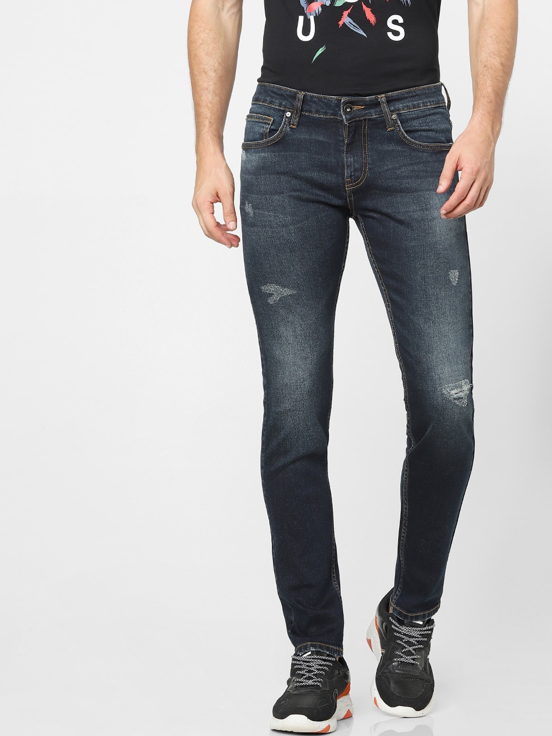 Buy Celio Men Blue Skinny Fit Mildly Distressed Light Fade Jeans ...