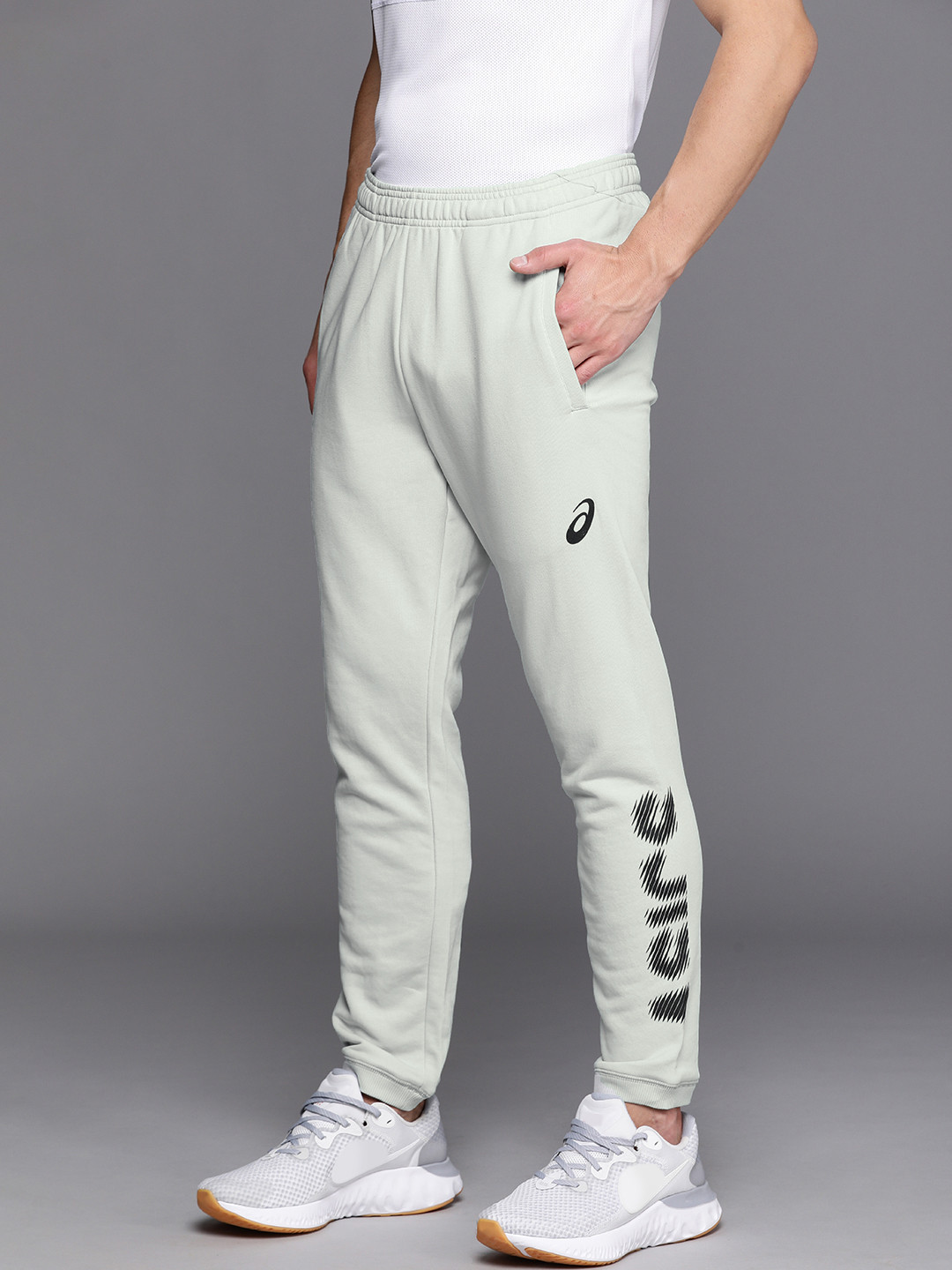 Buy ASICS Men White & Black BELOW KNEE GRAPHIC Printed Slim Fit Joggers