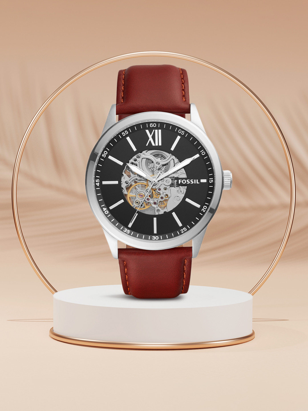 black dial brown strap