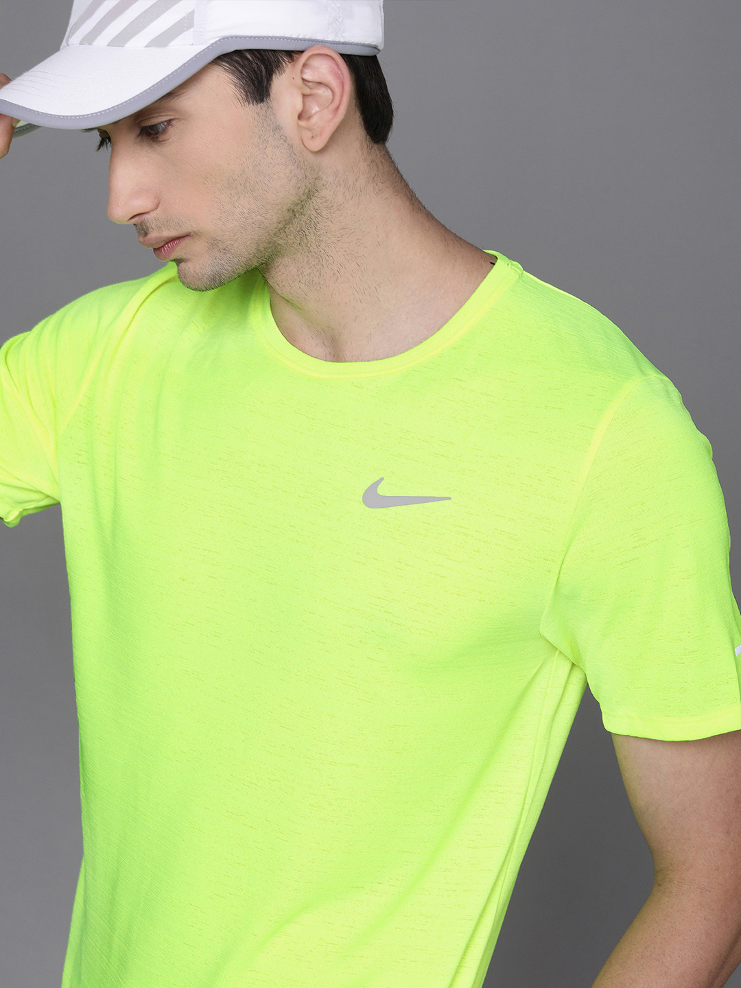 fluorescent green nike shirt