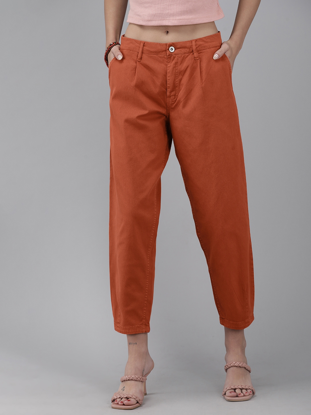rust orange trousers