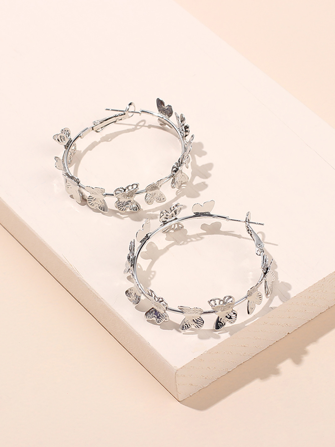 Buy URBANIC Silver Toned Circular Hoop Earrings Earrings for Women 15507228 Myntra