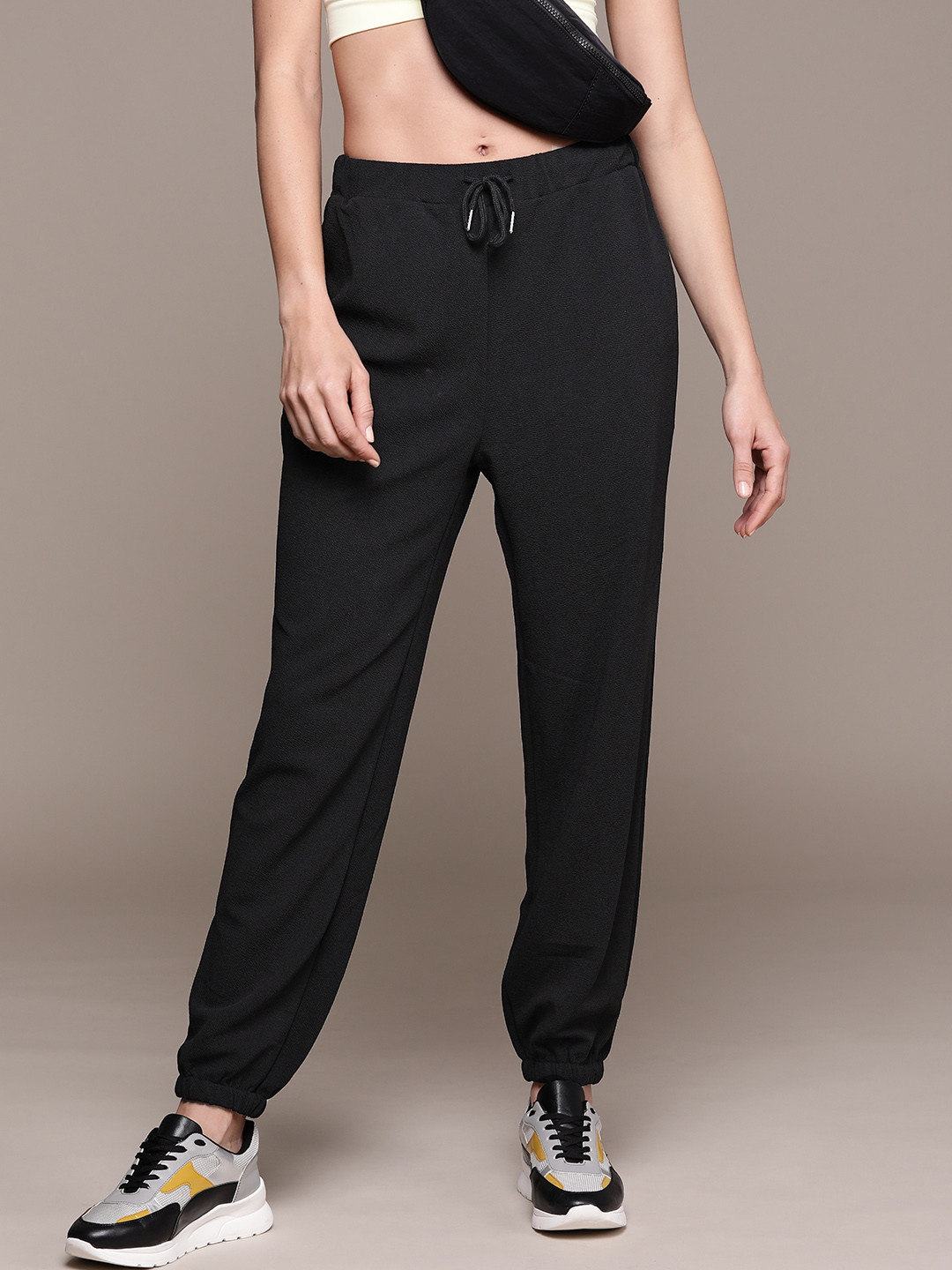 Buy URBANIC Women Black Solid Relaxed Fit Joggers Track Pants for