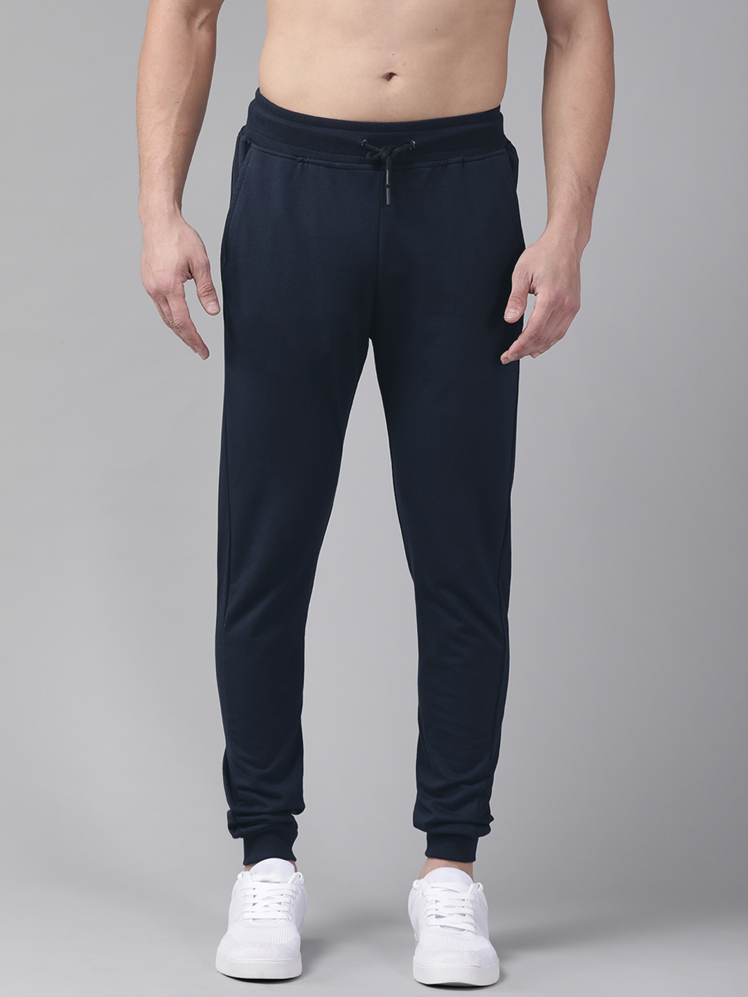 Buy Roadster Men Navy Blue Solid Knitted Relaxed Fit Joggers - Track ...