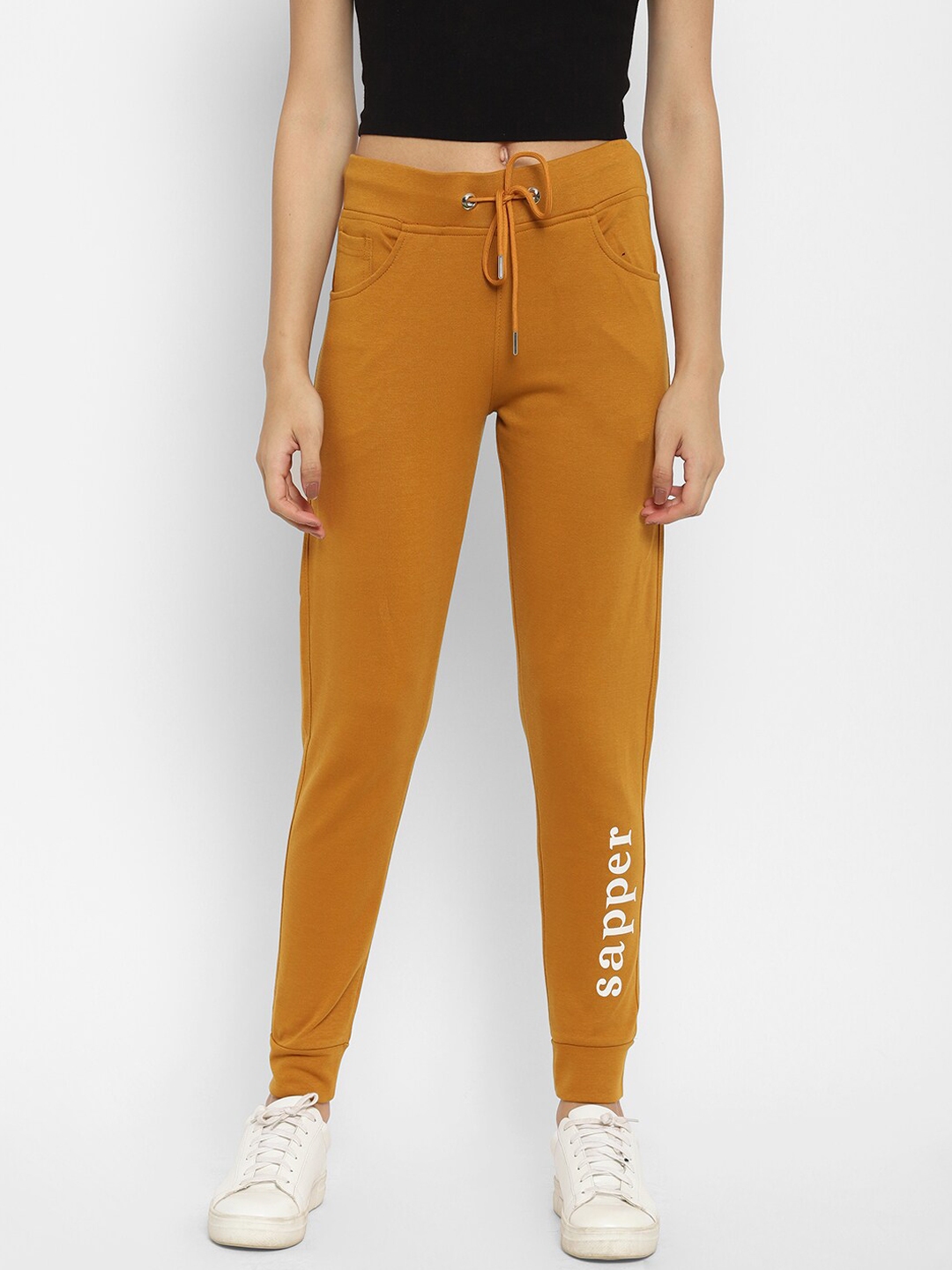 mustard track pants
