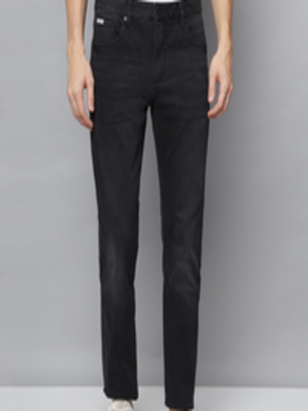 Buy LINDBERGH Men Black Tapered Fit Light Fade Stretchable Jeans ...