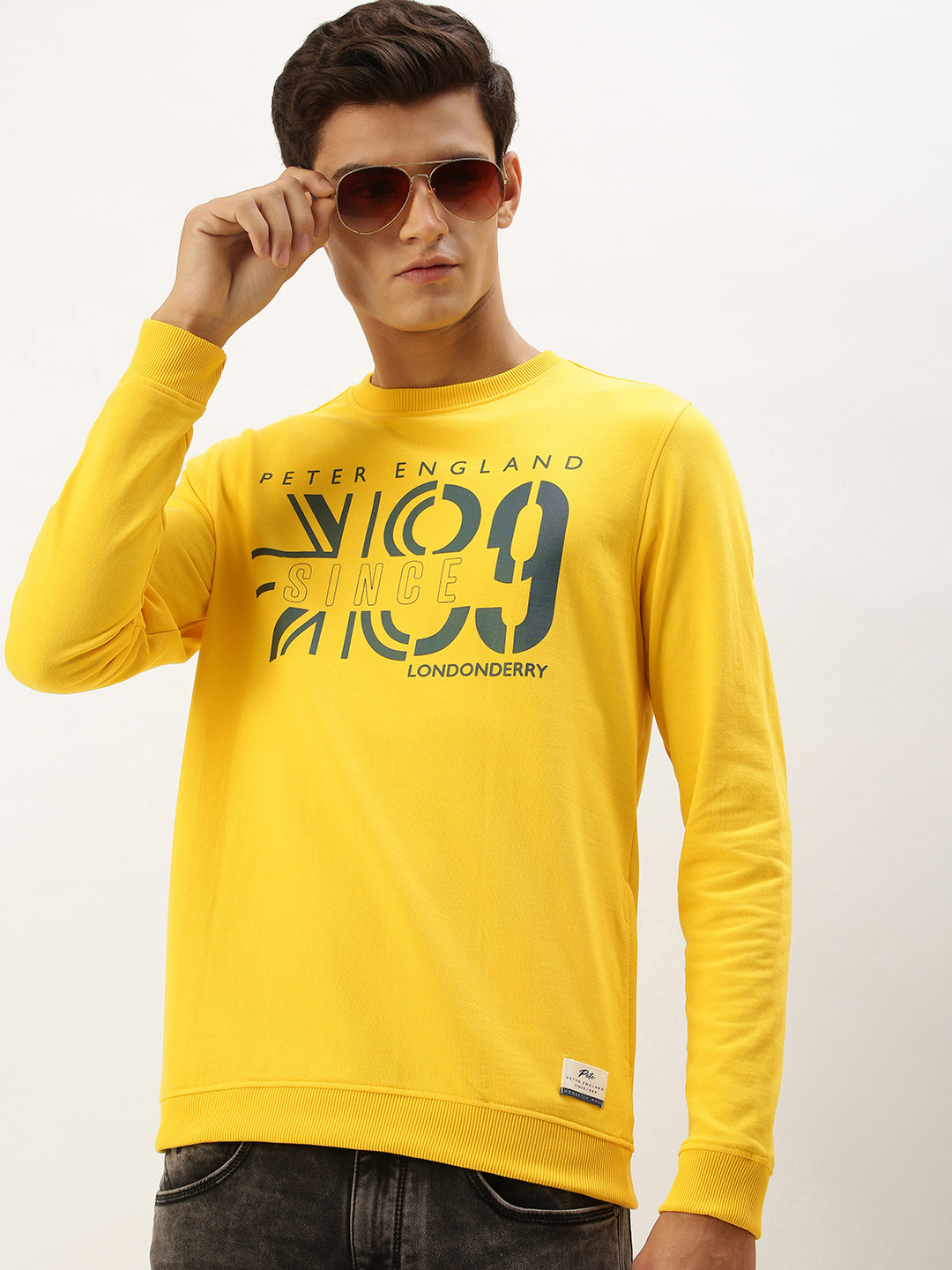 Buy Peter England Men Yellow Printed Sweatshirt Sweatshirts for Men