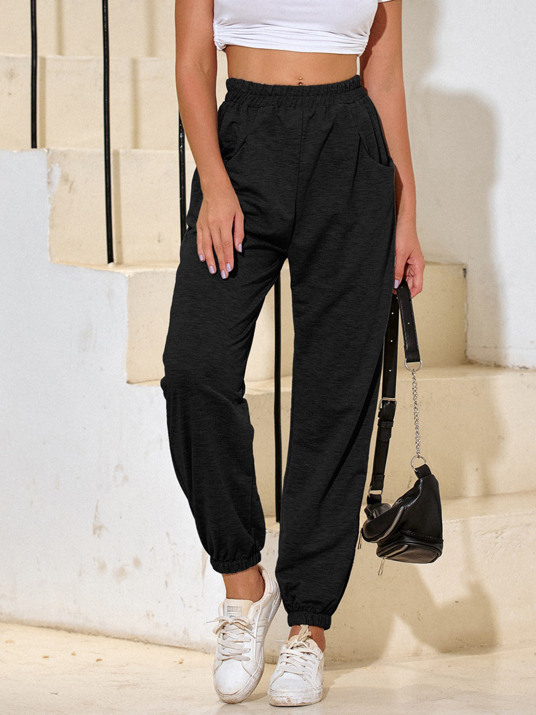 Buy URBANIC Women Black Solid Relaxed Fit Joggers - Track Pants for Women 15849492 | Myntra
