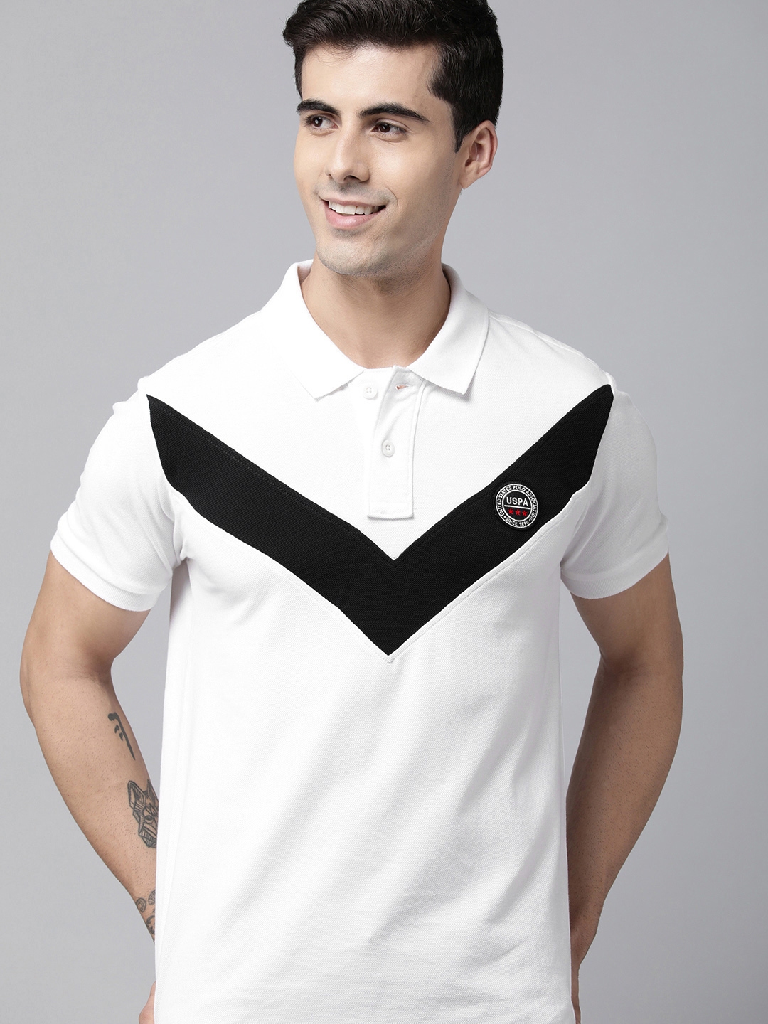 black t shirt and white pants