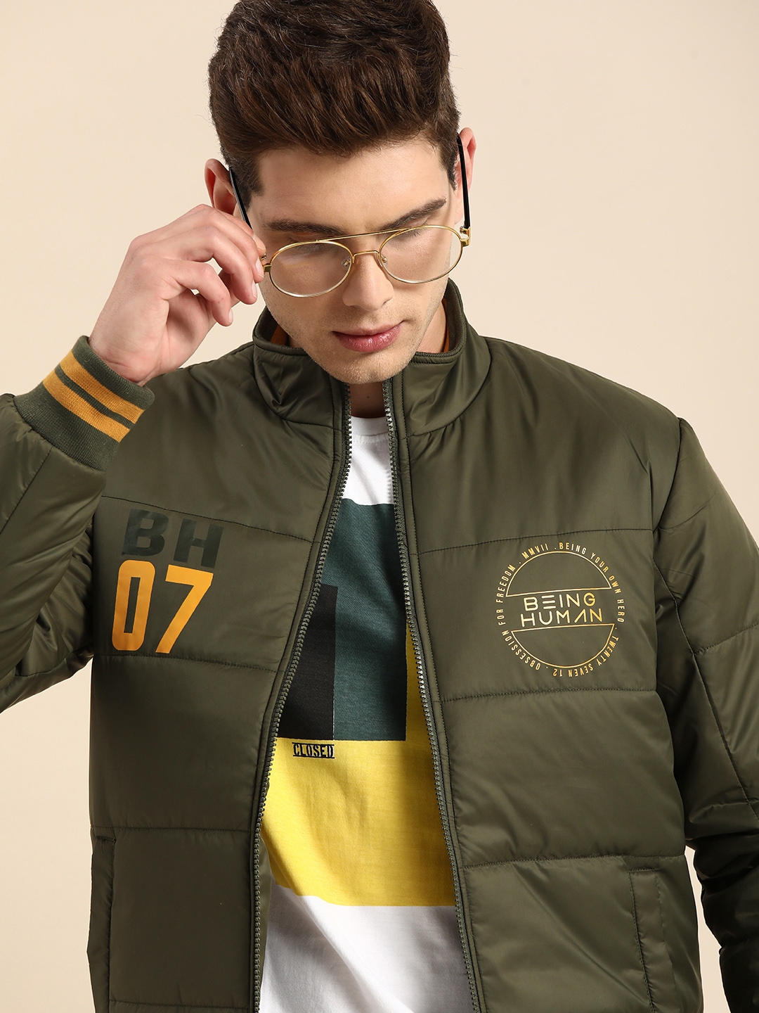 Buy Being Human Men Olive Green Padded Varsity Jacket With Printed ...