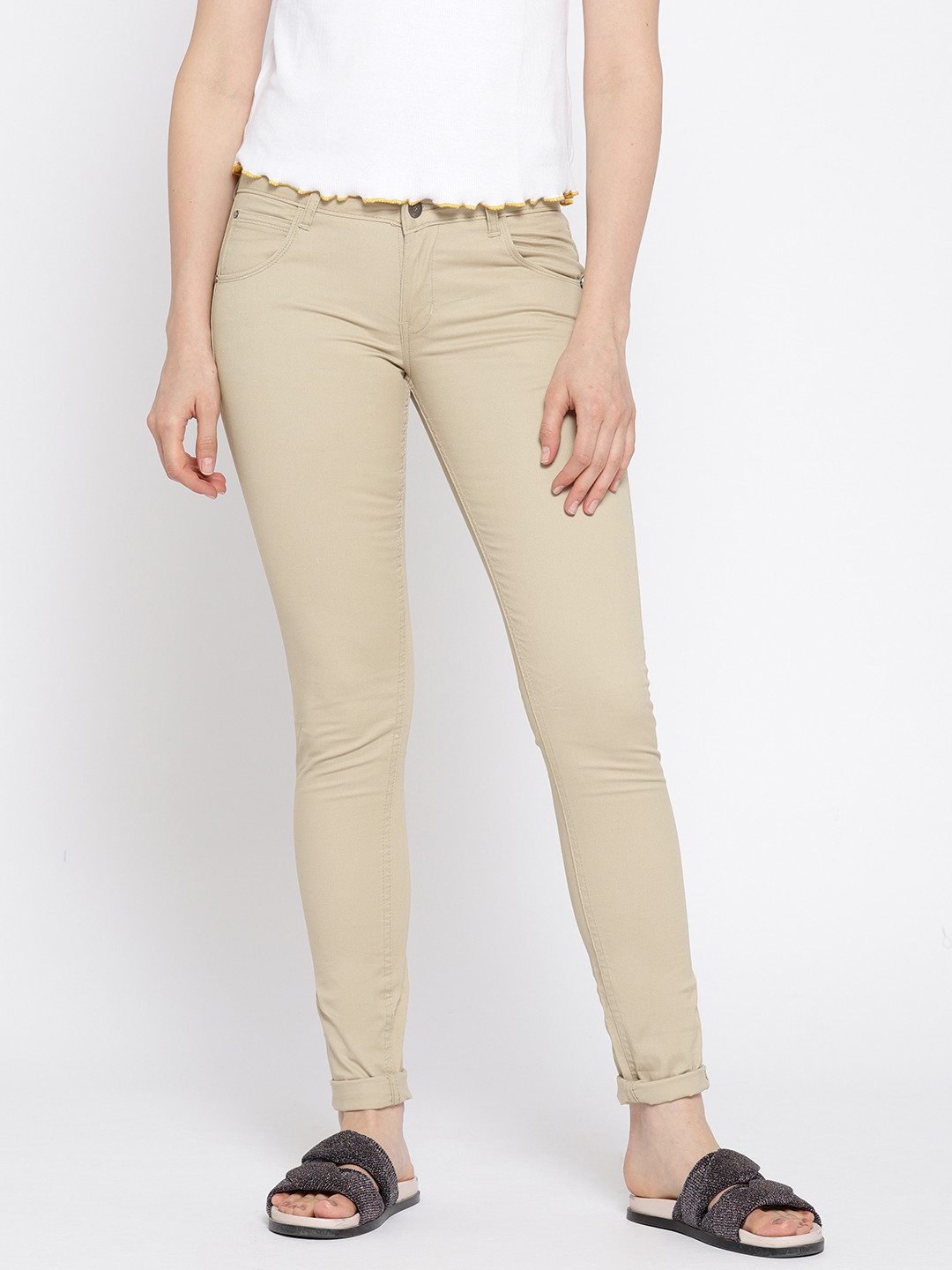 Buy AND Women Beige Solid Slim Fit Flat Front Trousers Trousers for