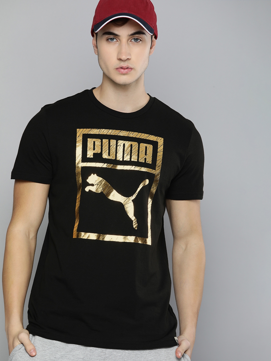 Buy Puma Men Black & Gold Toned Printed T Shirt - Tshirts for Men ...
