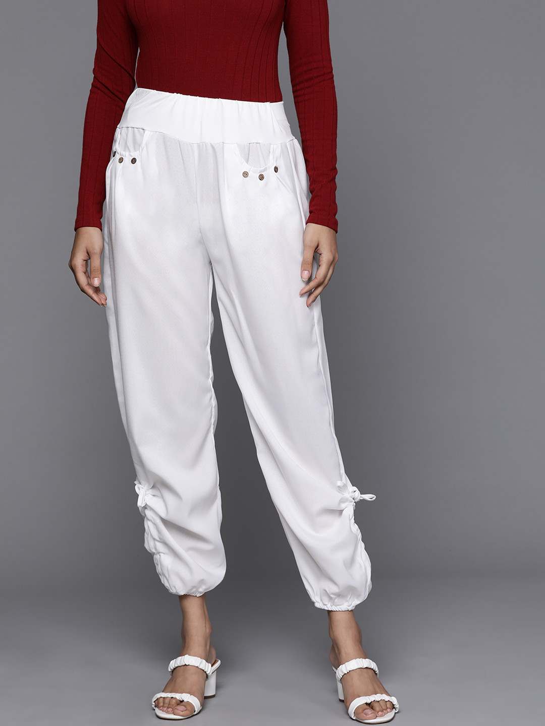 Buy JC Mode Women White Solid Joggers Trousers for Women 16531386