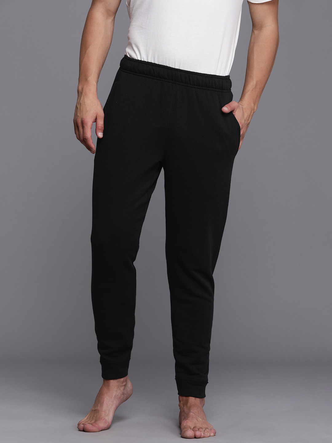Buy Nike Men Black Solid Yoga Dri FIT Joggers Track Pants for Men 16683766 Myntra