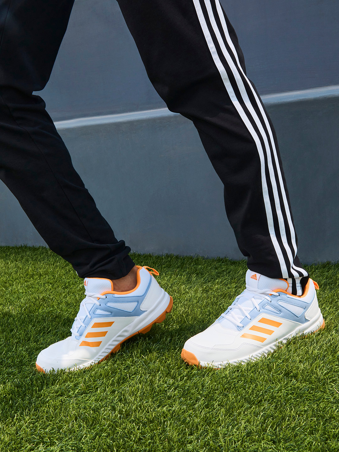 Buy ADIDAS Men White & Orange Woven Upper Perforated Leather Cri Rise V2 Cricket Shoes - Sports 