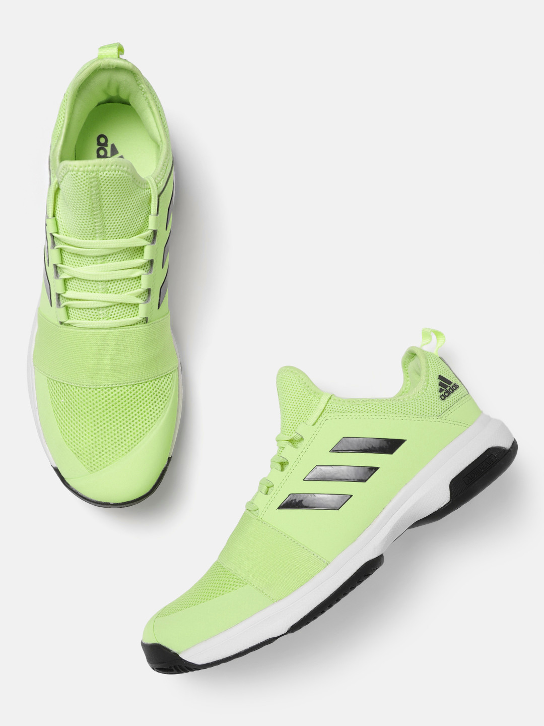 fluorescent green tennis shoes