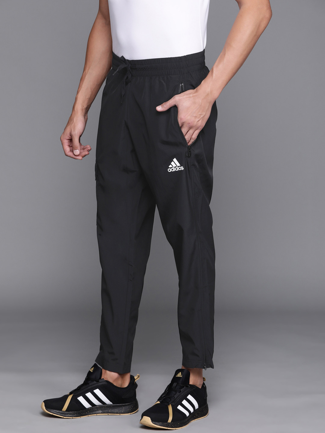 Buy ADIDAS Men Black Solid Essentials Brandlove 7/8 Woven Track Pants