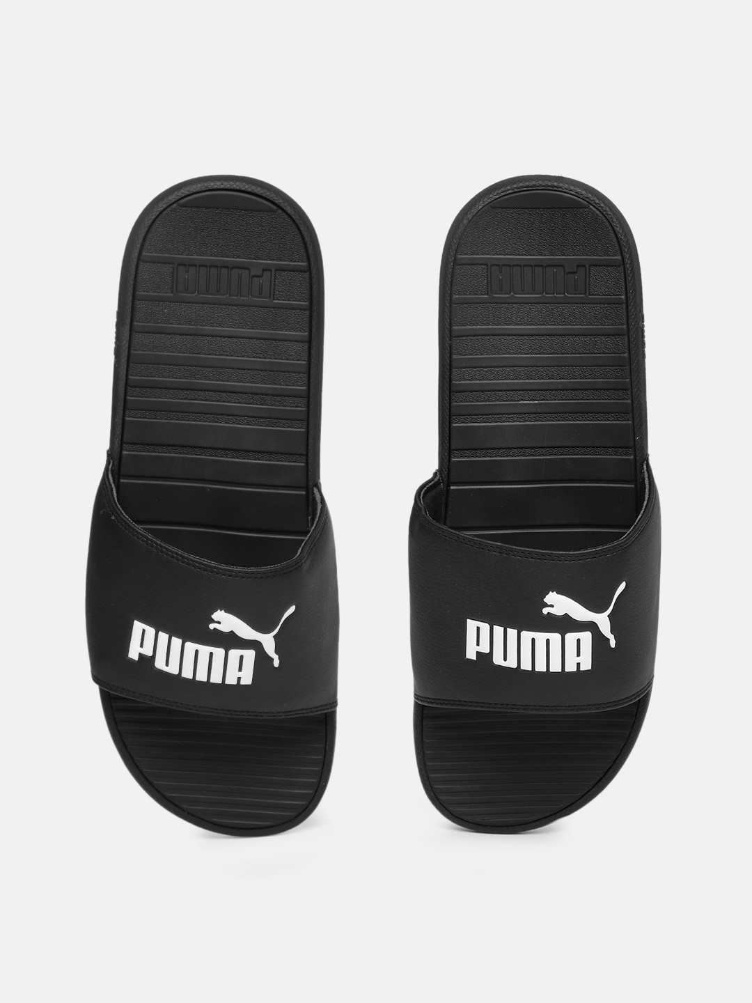 Buy Puma Unisex Black & White Solid Sliders - Flip Flops for Unisex