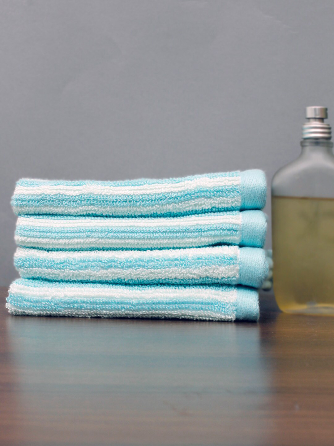 Buy AVI Living Set Of 4 Turquoise Blue & White 600 GSM Striped Face