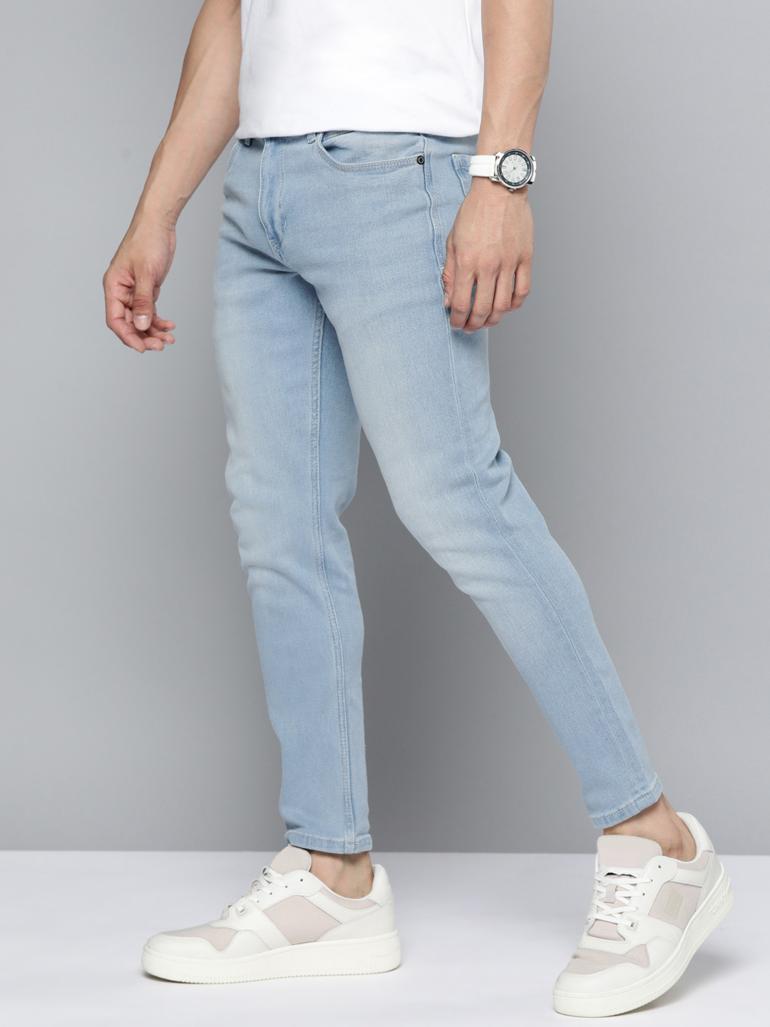 Buy Mast & Harbour Men Blue Carrot Light Fade Stretchable Jeans Jeans