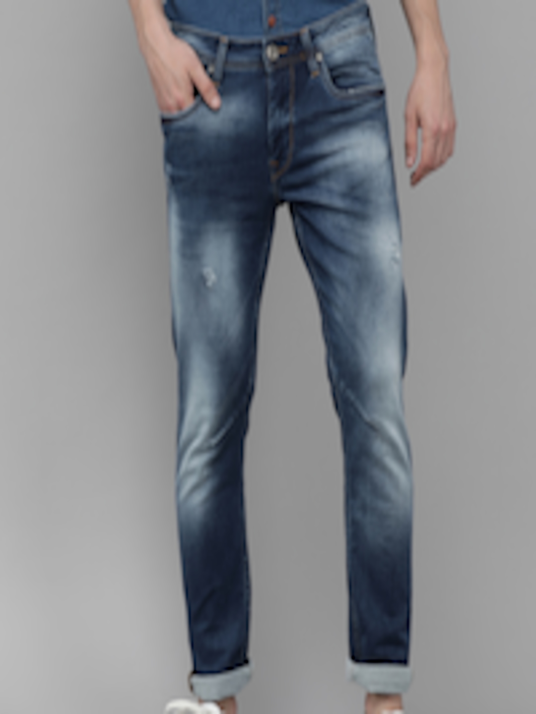 Buy Voi Jeans Men Navy Blue Solid Mildly Distressed Heavy Fade Skinny ...