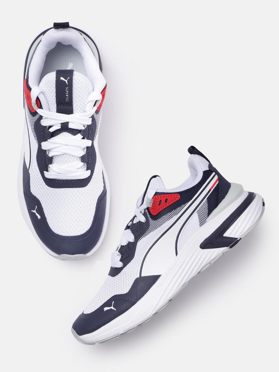 Buy Puma Men White & Blue Solid Soft Foam+ Supertec Regular Training